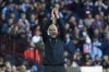 Aston Villa's Interim manager Aaron Danks applauds the players during the English Premier League soccer match between Aston Villa and Brentford at Villa Park in Birmingham, England, Sunday, Oct. 23, 2022. (AP Photo/Rui Vieira)