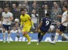 Newcastle's Callum Wilson, second right, scores his side's opening goal during the English Premier League soccer match between Tottenham Hotspur and Newcastle United at the Tottenham Hotspur Stadium in London, England, Sunday, Oct. 23, 2022. (AP Photo/Frank Augstein)