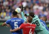 Bayern's goalkeeper Sven Ulreich, second right, makes a save in front of Hoffenheim's Ozan Kabak, left, during a German Bundesliga soccer match between TSG 1899 Hoffenheim and Bayern Munich in Sinsheim, Germany, Saturday, Oct. 22, 2022. (AP Photo/Michael Probst)