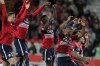 Lille players celebrates after defeating Monaco during the French League one soccer match between Lille and Monaco at the Pierre Mauroy stadium in Villeneuve d'Ascq, northern France, Sunday, Oct. 23, 2022. (Michel Spingler)