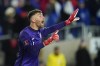 FILE - United States goalkeeper Matt Turner talks to teammates during the second half of a FIFA World Cup qualifying soccer match against El Salvador, Thursday, Jan. 27, 2022, in Columbus, Ohio. (AP Photo/Julio Cortez, File)