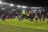 Napoli players celebrate at the end of a Serie A soccer match between Roma and Napoli, at the Olimpic stadium in Rome, Sunday, Oct. 23, 2022. (AP Photo/Andrew Medichini)