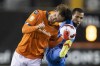 Hamilton Forge midfielder Alexander Achinioti-Jonsson (13) battles for a ball with Cruz Azul midfielder Romulo Otero (10) during the first half of the first leg of the 2022 CONCACAF Champions League Round of 16 in Hamilton, Ont., on Wednesday, Feb. 16, 2022. Atletico Ottawa's Ollie Bassett and Ballou Tabla and Forge FC's Achinioti-Jonsson, Kyle Bekker and Woobens Pacius, whose teams meet Sunday in the CPL championship game, are among the 10 finalists for the Canadian Premier League's inaugural Players' Player of the Year award.THE CANADIAN PRESS/Nick Iwanyshyn