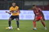 Sampdoria's Abdelhamid Sabiri, left, and Cremonese's Charles Pickel vie for the ball during a Serie A soccer match between Cremonese and Sampdoria at the Giovanni Zini Stadium, in Cremona, Italy, Monday, Oct. 24, 2022. (Claudio Grassi/LaPresse via AP)