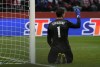 FILE - Poland goalkeeper Wojciech Szczesny reacts after Hungary's Andras Schafer scoring his side's opening goal during the World Cup 2022 group I qualifying soccer match between Poland and Hungary, at the Narodowy stadium in Warsaw, Poland, Monday, Nov. 15, 2021. (AP Photo/Czarek Sokolowski, File)
