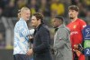 Manchester City's Erling Haaland, left, greets Dortmund's head coach Edin Terzic at the end of the Champions League Group G soccer match between Borussia Dortmund and Manchester City in Dortmund, Germany, Tuesday, Oct. 25, 2022. (AP Photo/Martin Meissner)