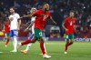 FILE - Morocco's Sofiane Boufal celebrates after scoring the opening goal during an international friendly soccer match between Morocco and Chile at the Cornella-El Prat stadium in Barcelona, Spain, Friday, Sept. 23, 2022. (AP Photo/Joan Monfort, File)