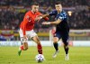 FILE - Austria's Stefan Posch, left, duels for the ball with Croatia's Ivan Perisic during the UEFA Nations League soccer match between Austria and Croatia at the Ernst Happel Stadion in Vienna, Austria, Sunday, Sept. 25, 2022. (AP Photo/Florian Schroetter, File)