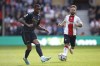 Arsenal's Gabriel, left, passes the ball past Southampton's Adam Armstrong during the English Premier League soccer match between Southampton and Arsenal at the Saint Mary's Stadium in Southampton, Sunday, Oct. 23, 2022. (AP Photo/David Cliff)