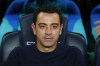 Barcelona's head coach Xavi Hernandez waits for the start of the Spanish La Liga soccer match between FC Barcelona and Villareal at Camp Nou stadium in Barcelona, Spain, Thursday, Oct. 20, 2022. (AP Photo/Joan Monfort)
