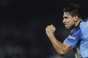 Napoli's Giovanni Simeone celebrates after scoring to 1-0 during the Champions League group A soccer match between SSC Napoli and Glasgow Rangers at Diego Armando Maradona stadium in Naples, Italy, Wednesday, Oct. 26, 2022. (Alessandro Garofalo/LaPresse via AP)
