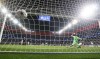 Marseille's Matteo Guendouzi scores his side's first goal against Frankfurt's goalkeeper Kevin Trapp during the Champions League Group D soccer match between Eintracht Frankfurt and Olympique de Marseille in Frankfurt, Germany, Wednesday, Oct. 26, 2022. (AP Photo/Martin Meissner)
