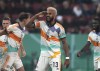 Bayern's Eric Maxim Choupo-Moting, centre, celebrates after scoring his side's third goal during the German soccer cup, DFB Pokal, match between FC Augsburg and FC Bayern Munich at the WWK Arena in Augsburg, Germany, Wednesday, Oct. 19, 2022. (AP Photo/Matthias Schrader)