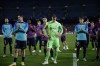Barcelona players stand in dejection as they applaud fans at the end of the Champions League Group C soccer match between Barcelona and Bayern Munich at the Camp Nou stadium in Barcelona, Spain, Wednesday, Oct. 26, 2022. (AP Photo/Joan Monfort)