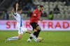 Rennes' Amine Gouiri, right, challenges for the ball with Dynamo Kyiv's Oleksandr Syrota during the Europa League group B soccer match between Dynamo Kyiv and Rennes at the Marszałek Piłsudski Stadium in Krakow, Poland, Thursday, Oct. 13, 2022. (AP Photo/Adam Nurkiewicz)