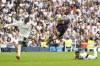Barcelona's Sergi Roberto attempts a shot at goal past Real Madrid's Ferland Mendy, left, during a Spanish La Liga soccer match between Real Madrid and Barcelona at the Santiago Bernabeu stadium in Madrid, Sunday, Oct. 16, 2022. (AP Photo/Manu Fernandez)
