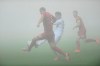 Kristian Pedersen of Cologne, left, and Milan Petrzelka of Slovackos in action during the 5th round soccer match of the European Conference League between FC Slovackos and Cologne, in Uherske Hradiste, Czech Republic, Thursday, Oct. 27, 2022. (Dalibor Gluck/CTK via AP)