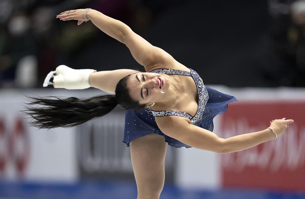 Canadians Schizas, Gilles and Poirier lead after Skate Canada short