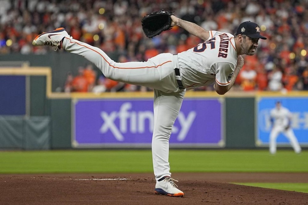Houston Astros starting pitcher Justin Verlander throws during the first inning in Game 1 of baseball's World Series between the Houston Astros and the Philadelphia Phillies on Friday, Oct. 28, 2022, in Houston. (AP Photo/Eric Gay)