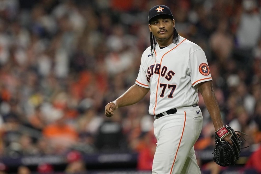 Houston Astros starting pitcher Luis Garcia reacts after giving a home run to Philadelphia Phillies' J.T. Realmuto during the 10th inning in Game 1 of baseball's World Series between the Houston Astros and the Philadelphia Phillies on Friday, Oct. 28, 2022, in Houston. (AP Photo/David J. Phillip)