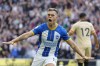 Brighton's Leandro Trossard celebrates scoring his side's first goal during the English Premier League soccer match between Brighton and Hove Albion and Chelsea at the Amex stadium in Brighton, England, Saturday, Oct. 29, 2022. (AP Photo/Kirsty Wigglesworth)