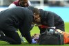 Aston Villa goalkeeper Emiliano Martinez receives treatment during the English Premier League soccer match between Newcastle United and Aston Villa at St. James' Park, Newcastle, England, Saturday, Oct. 29, 2022. (Owen Humphreys/PA via AP)