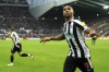 Newcastle United's Callum Wilson celebrates scoring their side's second goal of the game during the English Premier League soccer match between Newcastle United and Aston Villa at St. James' Park, Newcastle, England, Saturday, Oct. 29, 2022. (Owen Humphreys/PA via AP)