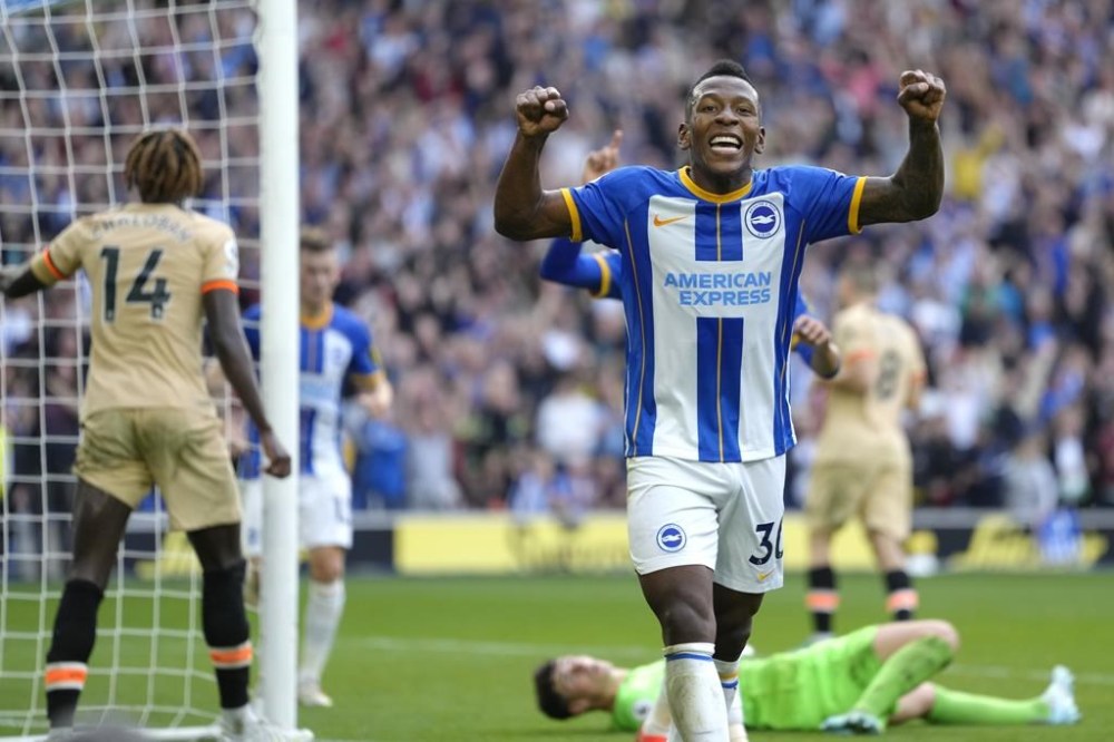 Brighton's Pervis Estupinan celebrates after scoring his side's third goal during the English Premier League soccer match between Brighton and Hove Albion and Chelsea at the Amex stadium in Brighton, England, Saturday, Oct. 29, 2022. (AP Photo/Kirsty Wigglesworth)