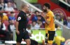 Referee Robert Madley, left. shows Wolverhampton Wanderers' Diego Costa a red card after a VAR check for serious foul play, during the English Premier League soccer match between Brentford and Wolverhampton Wanderers, at the Gtech Community Stadium, in London, Saturday, Oct. 29, 2022. (John Walton/PA via AP)