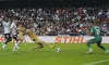 Barcelona's Robert Lewandowski scores the opening goal in extra time during a Spanish La Liga soccer match between Valencia and Barcelona at the Mestalla stadium in Valencia, Spain, Saturday, Oct. 29, 2022. (AP Photo/Alberto Saiz)