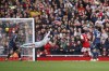 Arsenal's Thomas Partey, second right, watches as his shot passes Nottingham Forest's goalkeeper Dean Henderson as he scores his sides 4th goal of the game during the English Premier League soccer match between, Arsenal and Nottingham Forrest at the Emirates stadium in London, Sunday, Oct. 30, 2022. (AP Photo/David Cliff)