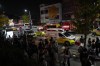 Ambulances carrying victims head to the hospital near the scene in Seoul, South Korea, Sunday, Oct. 30, 2022. Global Affairs says a Canadian was injured in a crowd surge that killed more than 150 people in Seoul, South Korea. THE CANADIAN PRESS/AP-Lee Jin-man