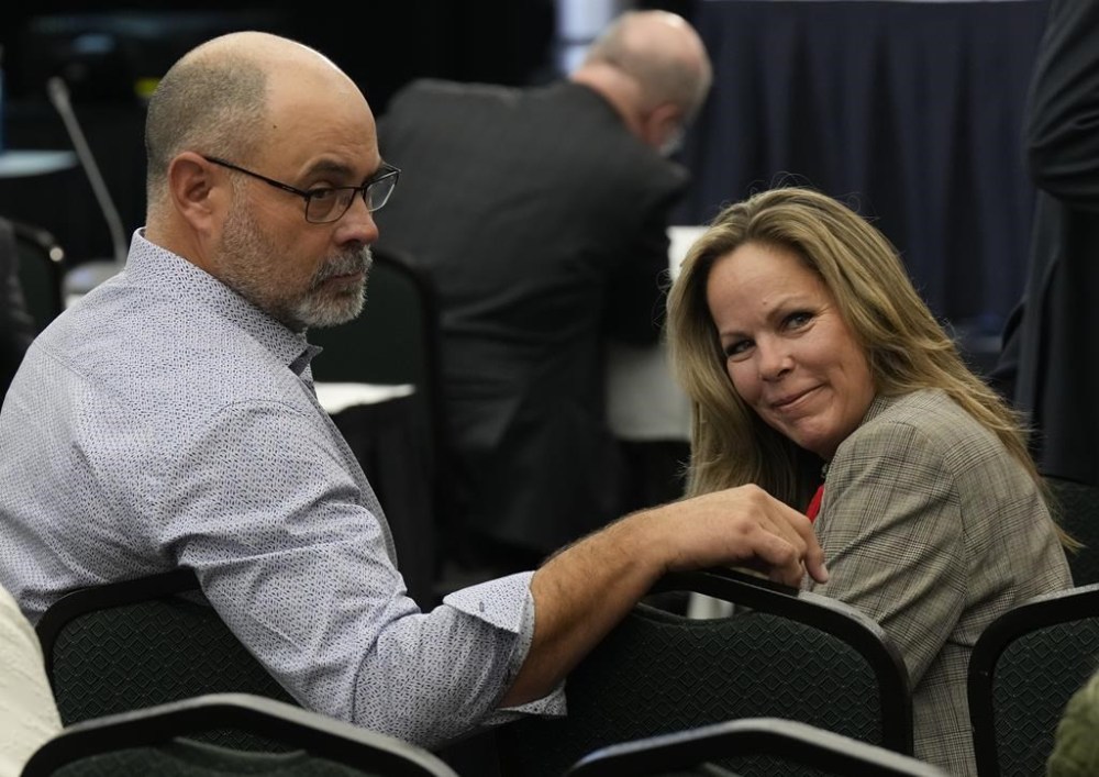 Freedom Convoy organizers Tamara Lich and Chris Barber wait for the Public Order Emergency Commission to begin, Tuesday, Nov. 1, 2022 in Ottawa. THE CANADIAN PRESS/Adrian Wyld