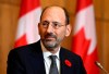 Correctional Investigator of Canada Dr. Ivan Zinger listens during a news conference to discuss the 2021-22 annual report, in Ottawa, on Tuesday, Nov. 1, 2022. THE CANADIAN PRESS/Justin Tang