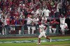 Philadelphia Phillies' Kyle Schwarber rounds the bases after a two-run home run during the fifth inning in Game 3 of baseball's World Series between the Houston Astros and the Philadelphia Phillies on Tuesday, Nov. 1, 2022, in Philadelphia. (AP Photo/Matt Rourke)