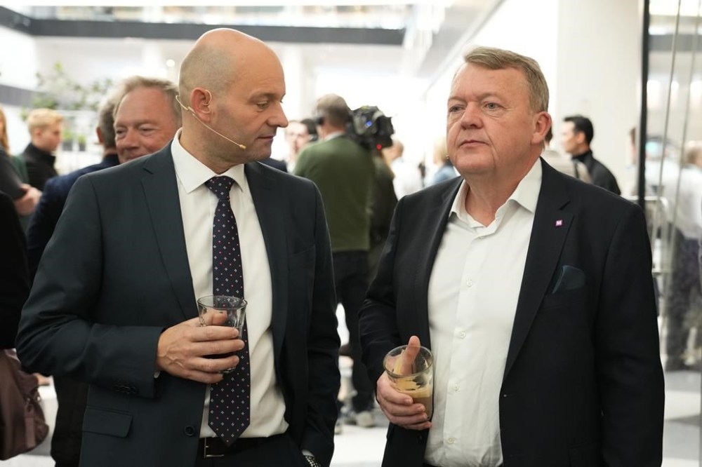 Leader of the Moderates Lars Loekke Rasmussen, right, and head of the Conservative People's Party Soeren Pape Poulsen talk before the traditional post-election debates in Copenhagen, Denmark, Wednesday, Nov. 2, 2022. Voters in Greenland secured the last two seats necessary for the center-left bloc of Prime Minister Mette Frederiksen to win Denmark's general election. (AP Photo/Sergei Grits)
