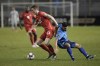 FILE - Canada's Scott Kennedy, left, and El Salvador's Nelson Bonilla compete for the ball during a qualifying soccer match for the FIFA World Cup Qatar 2022 at Cuscatlan stadium in San Salvador, El Salvador, Wednesday, Feb. 2, 2022. Canadian defender Scott Kennedy will miss the World Cup after injuring a shoulder. The 25-year-old, who has eight international appearances, was hurt Saturday, Oct. 29 while playing for Regensburg against Rostock in the German second tier. (AP Photo/Moises Castillo)