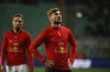 Leipzig's Timo Werner, right, hands on the pitch prior to the start of the Champions League group F soccer match between Shakhtar Donetsk and Leipzig at Polish Army Stadium stadium in Warsaw, Wednesday, Nov. 2, 2022. (AP Photo/Michal Dyjuk)