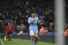 Manchester City's Rico Lewis salutes the fans after being substituted during the group G Champions League soccer match between Manchester City and Sevilla at the Etihad stadium in Manchester, England, Wednesday, Nov. 2, 2022. (AP Photo/Rui Vieira)
