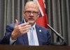 Kelvin Goertzen speaks to the media at the Legislative Building in Winnipeg on Wednesday September 1, 2021. Manitoba Justice Minister Kelvin Goertzen says the Progressive Conservative government is not planning to call an early election.THE CANADIAN PRESS/David Lipnowski