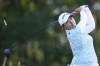 FILE - Ai Suzuki, of Japan, watches her shot off the second tee during the first round of the U.S. Women's Open golf tournament at the Pine Needles Lodge & Golf Club in Southern Pines, N.C., on June 2, 2022. Japanese players Suzuki and Momoko Ueda each shot 7-under 65s on Thursday, Nov. 3, to sit atop the Toto Classic after the first round. (AP Photo/Steve Helber, File)
