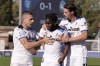Atalanta's Ademola Lookman, center, is celebrated by teammates, including Hans Hateboer, right, after scoring their side's second goal during a Serie A soccer match between Empoli and Atalanta, in Empoli's Castellani stadium, Italy, Sunday, Oct. 30, 2022. (Marco Bucco/LaPresse via AP)