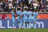 Troyes' Mama Baldé celebrates with this teammates after scoring his side's opening goal the French League One soccer match between Paris Saint-Germain and Troyes at the Parc des Princes in Paris, France, Saturday, Oct. 29, 2022. (AP Photo/Francois Mori)