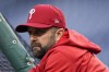 Philadelphia Phillies hitting coach Kevin Long watches during batting practice before Game 4 of baseball's World Series between the Houston Astros and the Philadelphia Phillies on Wednesday, Nov. 2, 2022, in Philadelphia. (AP Photo/David J. Phillip)