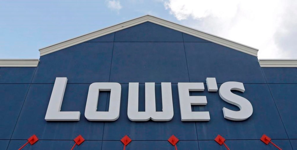 Lowe's store signage is shown, in Hialeah, Fla., Wednesday, June 29, 2016. Lowe's announced Thursday it's selling its Canadian retail arm to a private equity firm. THE CANADIAN PRESS/AP-Alan Diaz