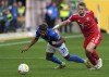 Hoffenheim's Georginio Rutter, left, duels for the ball with Bayern's Matthijs de Ligt during a German Bundesliga soccer match between TSG 1899 Hoffenheim and Bayern Munich in Sinsheim, Germany, Saturday, Oct. 22, 2022. (AP Photo/Michael Probst)