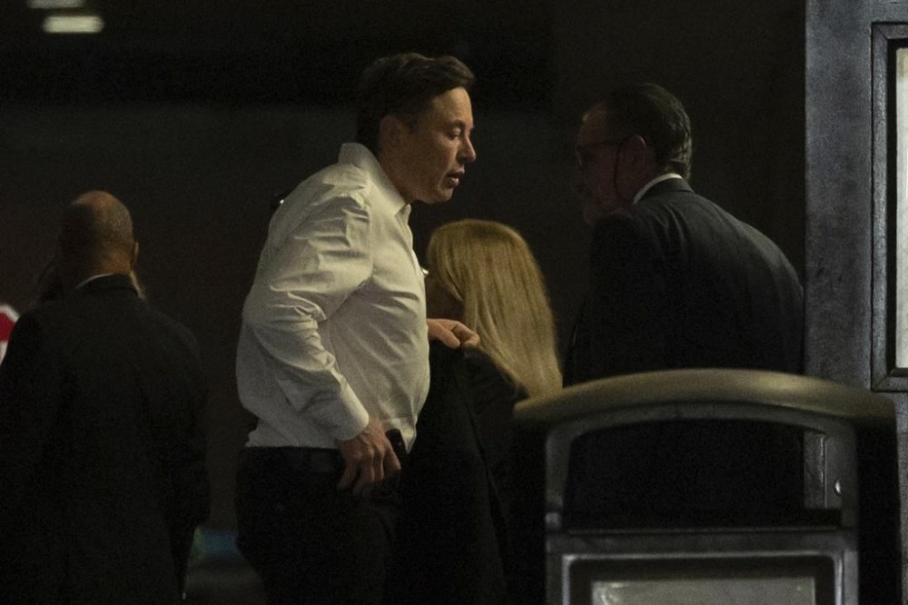 Elon Musk arrives at Baron Investment Conference at the Metropolitan Opera House, Friday, Nov. 4, 2022, in New York. Employees are bracing for widespread layoffs at Twitter as Musk overhauls the social platform. (AP Photo/Yuki Iwamura)