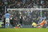 Fulham's Andreas Pereira, 3rd left, scores his side's first goal from the penalty spot during the English Premier League soccer match between Manchester City and Fulham at Etihad stadium in Manchester, England, Saturday, Nov. 5, 2022. (AP Photo/Dave Thompson)