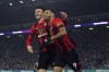 Bournemouth's Dominic Solanke, right, celebrates with Kieffer Moore after scoring his side's third goal of the game, during the English Premier League soccer match between Leeds United and Bournemouth, at Elland Road, in Leeds, England, Saturday, Nov. 5, 2022. (Ian Hodgson/PA via AP)