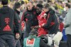 FILE - Bayern's Alphonso Davies, center, leaves the field after getting injured during the German Bundesliga soccer match between Borussia Dortmund and Bayern Munich in Dortmund, Germany, Saturday, Oct. 8, 2022. Canada is sweating on the fitness of Alphonso Davies after he went off with an apparent leg injury while playing for Bayern Munich just over two weeks before the World Cup is due to begin. (AP Photo/Martin Meissner, File)